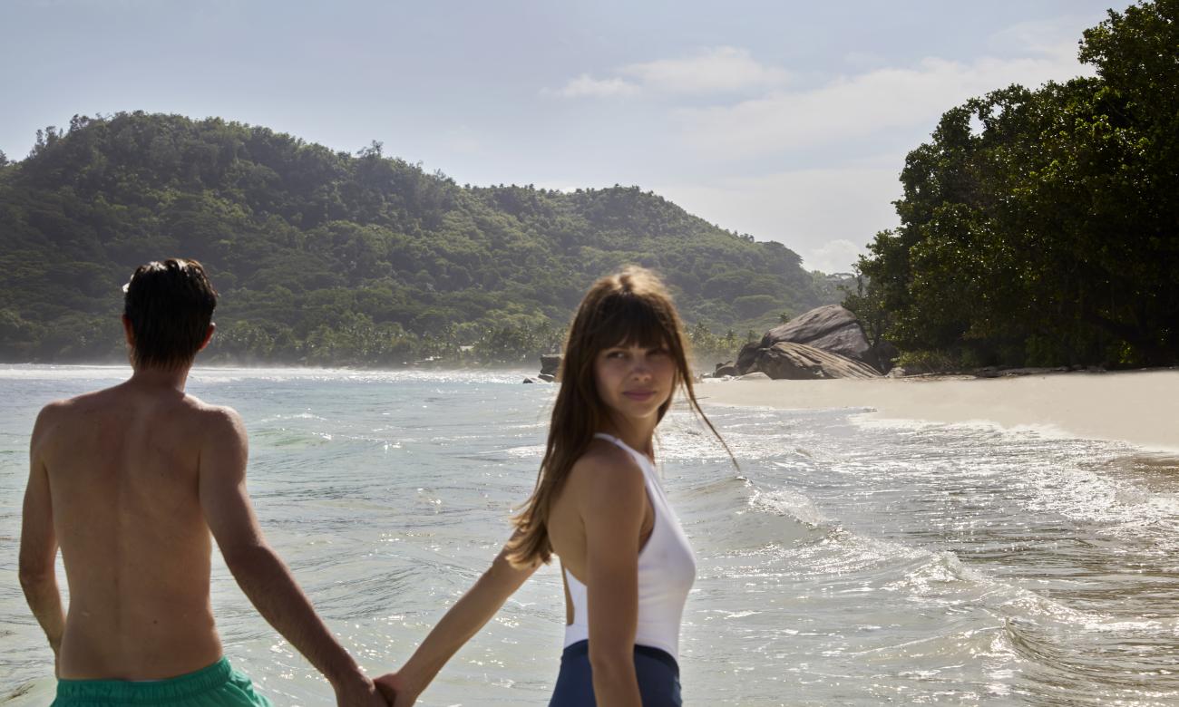 Couple walking on the beach
